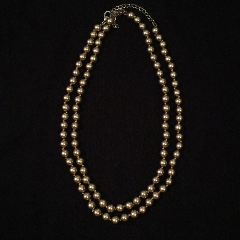 Two gold beaded necklaces
